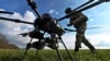 Un militar ucrainean verifică o conexiune cu un vehicul aerian fără pilot (UAV) Vampire (dronă de atac ucraineană) înainte de a zbura lângă linia frontului. Regiunea Zaporojie, 2 februarie 2024