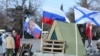 Інсталяція блокпоста на в'їзді до міста періоду 2014 року. Севастополь, Крим, 23 лютого 2024 року