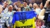 В Україні випустили монету, присвячену завоюванню кримчанином Усиком звання абсолютного чемпіона світу з боксу