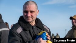 Звільнення 207 українських полонених (фоторепортаж)