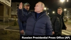 Президент России Владимир Путин в Мариуполе, 19 марта 2023 года.