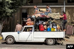 Civilii palestinieni își evacuează casa din Rafah, în sudul Fâșiei Gaza, pe 1 noiembrie 2023.