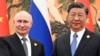 Fotografie distribuită de agenția rusă de stat Sputnik: președintele rus Vladimir Putin și președintele chinez Xi Jinping, în timpul unei întâlniri la Beijing, pe 18 octombrie 2023.