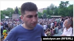 Armenia - David Sanasarian, a Rise Armenia coordinator, in Yerevan's Liberty Square, 6July, 2015