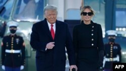 Președintele Donald Trump și soția sa, Melania, în ultima zi a mandatului, Washington, 20 ianuarie 2021.