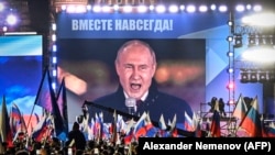Президент России Владимир Путин выступает на митинге и концерте, посвященном аннексии четырех регионов Украины, оккупированных российскими войсками. Москва, 30 сентября 2022 года.