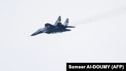 Një avion MiG-29 i ushtrisë ukrainase duke fluturuar mbi Ukrainën lindore. 1 janar 2023.