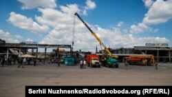 Последствия ракетного удара по ТЦ в Кременчуге