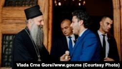 Премиерот на Црна Гора Дритан Абазовиќ со патријархот на СПЦ Порфириј, 20 јуни 2022