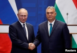 Ruski predsednik Vladimir Putin i Orban posle razgovora u Budimpešti 2019.