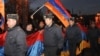 Armenia -- Riot police escort thousands of opposition supporters marching through central Yerevan, 18Feb2011.