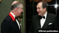 Britain - Prince Charles and former Armenian Prime Minister Armen Sarkissian (R) at a 2010 fundraising gala in London.