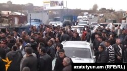 Armenia - Farmers in Aragatsotn province block a highway in protest against construction of a hydroelectric plant, 6Mar2014.