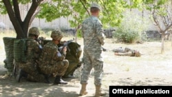 Armenia - A U.S. military instructor trains teaching personnel for the Armenian army’s paramedic school, 28Aug2015.
