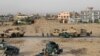 Afghan security forces take their positions in Kunduz city on September 29.