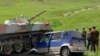 Gyrgyz raýatynyň ulagy özbek harbylarynyň tanky bilen çaknyşdy, Özbegistanyň Soh anklawy, Gyrgyzystanyň Batken regiony. 