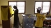 Sudan -- A south Sudanese woman votes at a polling station during the referendum in Juba, 09Jan2011