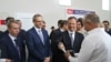 Franco Frattini (centru) și negociatorii-şefi de la Chişinău şi Tiraspol, Cristina Lesnic şi Vitali Ignatiev (al doilea din dreapta) la ceremonia de înmânare a plăcuțelor auto neutre. Tiraspol, 10 septembrie 2018