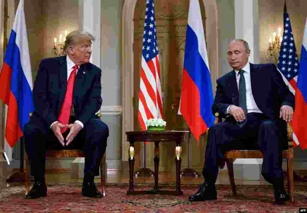 Donald Trump și Vladimir Putin, înaintea unei întâlniri de la Helsinki, Finlanda, de pe 16 iulie 2018. 