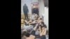 Кадр из видео об избиении мигрантов в московской бане.