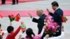 File photo of Afghan President Ashraf Ghani Ahmadzai and China's President Xi Jinping (R).