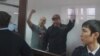 Гражданские активисты Макс Бокаев (слева) и Талгат Аян в суде. Атырау, 28 ноября 2016 года.