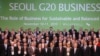 South Korea -- Heads of business pose for a family photo during a 'Green Growth' session of the G20 Business summit in Seoul, 11Nov2010