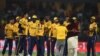 Cricketers of Peshawar Zalmi celebrate after winning the Twenty20 cricket match of the Pakistan Super League against Karachi King in Lahore last March. ALI
