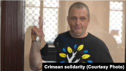 Фрилансер Крим.Реалії Владислав Єсипенко в залі підконтрольного Росії Сімферопольського районного суду, 15 липня 2021 року