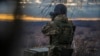 Ukraine -- Soldier looks at the slagheap controled by prorussian rebels from position of the Ukrainian military on the slagheap near the mine of Zolote-4, 13Dec2017