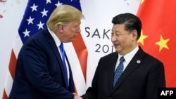 Дональд Трамп и Си Цзиньпин на саммите G20 в Осаке, Япония, 28 июня 2019 года