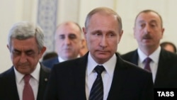 Russia -- Armenian President Serzh Sarkisian, Russian President Vladimir Putin and Azerbaijani President Ilham Aliyev meet to discuss the Nagorno-Karabakh settlement , in St. Petersburg, June 20, 2016