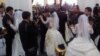 Свадьбы в рамках благотворительной акции Гульнары Каримовой. 