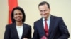 Держсекретар США Кондоліза Райс та Міністр закордонних справ Польщі Радек Сікорскі після підписання договору. 20 серпня 2008 р.