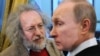 Then-Prime Minister Vladimir Putin pilloried Ekho Moskvy editor in chief Aleksei Venediktov (left) at a January 2012 meeting of editors of major news outlets, saying the station “pours diarrhea on me day and night.”