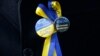 Мітингувальник у Лондоні, 14 березня 2014 року