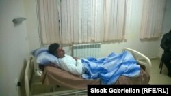 Armenia -- Opposition activist Ashot Piliposian treated in hospital after being assaulted in Hrazdan, 12Dec2014