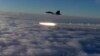 RUSSIA -- An Su-30 fighter jet of the Russian air force launches a missile during maneuvers in southern Russia, September 27, 2018