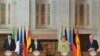 (Зліва направо) Мар’яно Рахой, Франсуа Олланд, Анґела Меркель та Маріо Монті, Брюссель, 22 червня 2012 року