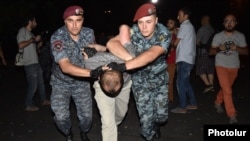 Armenia - Riot police detain a protester on Marshal Bagramian Avenue, Yerevan, 12Sep2015.