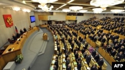 Russia -- Newly elected lawmakers listen to the national anthem during the opening of the first session of Russia's lower house of parliament, the State Duma, in Moscow,, 21Dec2011