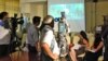 Журналистам показывают отрывки из фильмов конкурсной программы кинофестиваля «Евразия». Алматы, 15 августа 2012 года.