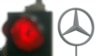 Germany -- A traffic light as it signalizes red in front of the Mercedes star logo at the car constructer's plant in Sindelfingen, 28Sep2005