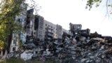 Угледар в Донецкой области Украины Россия захватила в октябре 2024 года. Бои за город длились два года. Сейчас там остались лишь руины. На этом фото &mdash;разрушенные жилые дома в Угледаре, сентябрь 2023 года