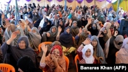 Members of the Shia Hazara minority sit-in during a protest in Quetta on April 15.
