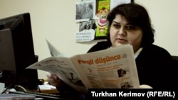 Jurnalista fotografiată la Baku în 2012