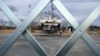 O fotografie compusă din patru capturi video din 14 martie 2011. Ele redau în succesiune cronologică explozia complexului nuclear Fukushima Daiichi. O explozie de hidrogen a zguduit centrala nucleară, autoritățile străduindu-se să prevină colapsul și explozia structurii după cutremurul masiv și tsunamiul care avuseseră loc cu trei zile înainte.