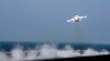 Сириялык учакты атып түшүргөн F/A-18E Super Hornet аттуу америкалык кыргыч учак. AFP. 