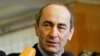 ARMENIA -- Then Armenian President Robert Kocharian talks to the media at a polling station in Yerevan, February 19, 2008