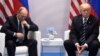 АКШ президенти Дональд Трамп менен Орусиянын президенти Владимир Путин "Чоң жыйырманын" Гамбургдагы саммитинде. 7-июль, 2017-жыл. 